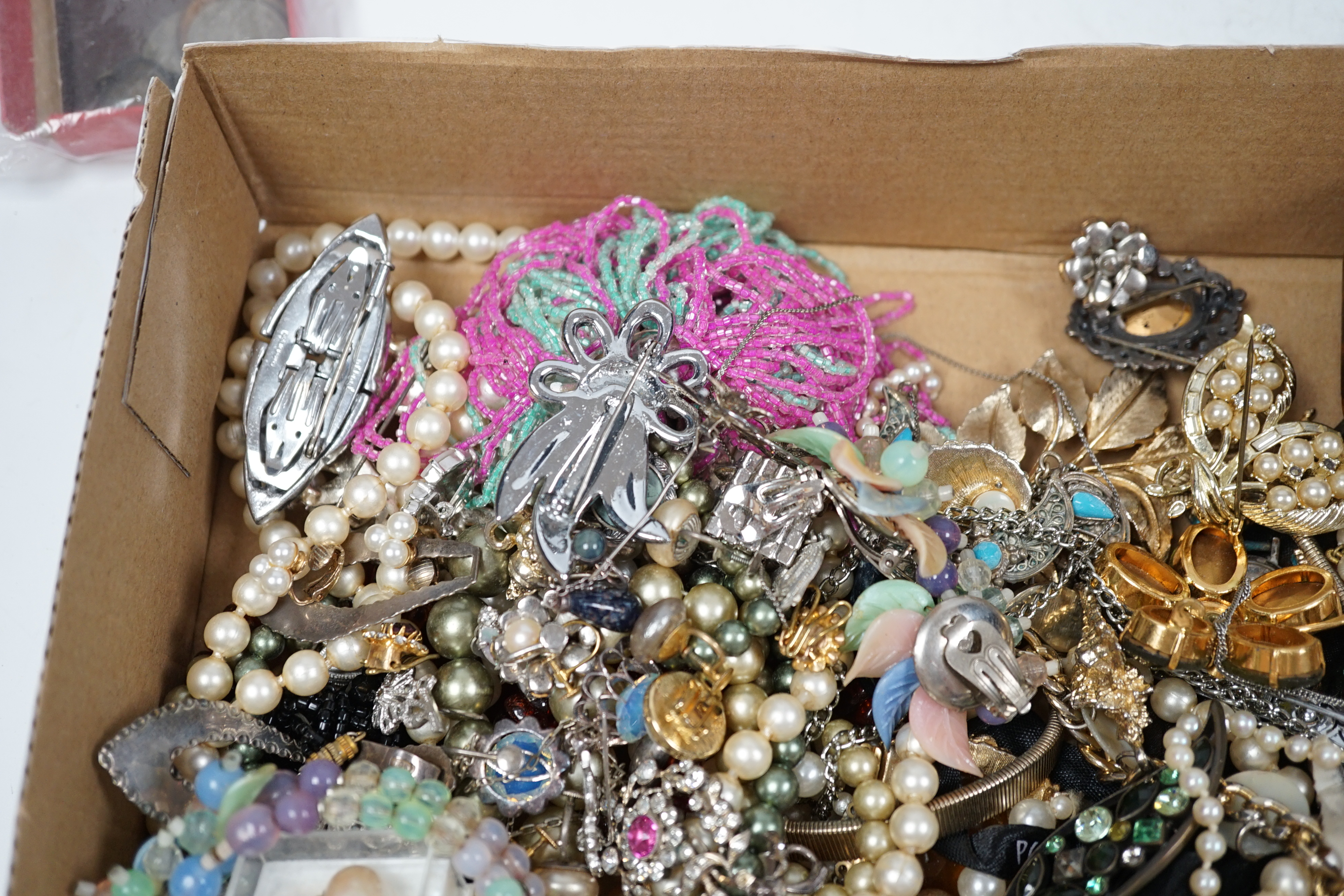 A quantity of assorted costume jewellery including cultured pearl necklace and rock crystal? cross pendant.